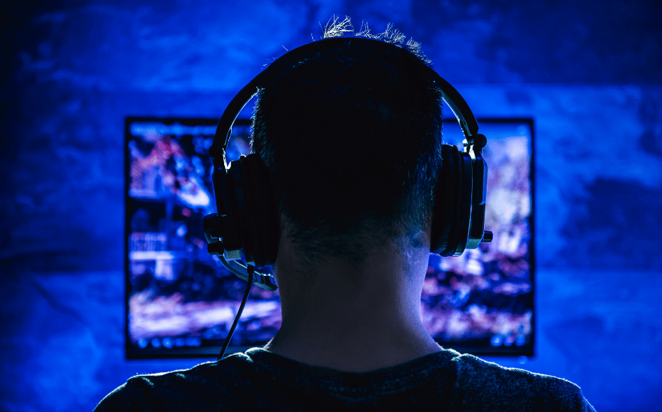 a man playing a video games representing live streaming video game business