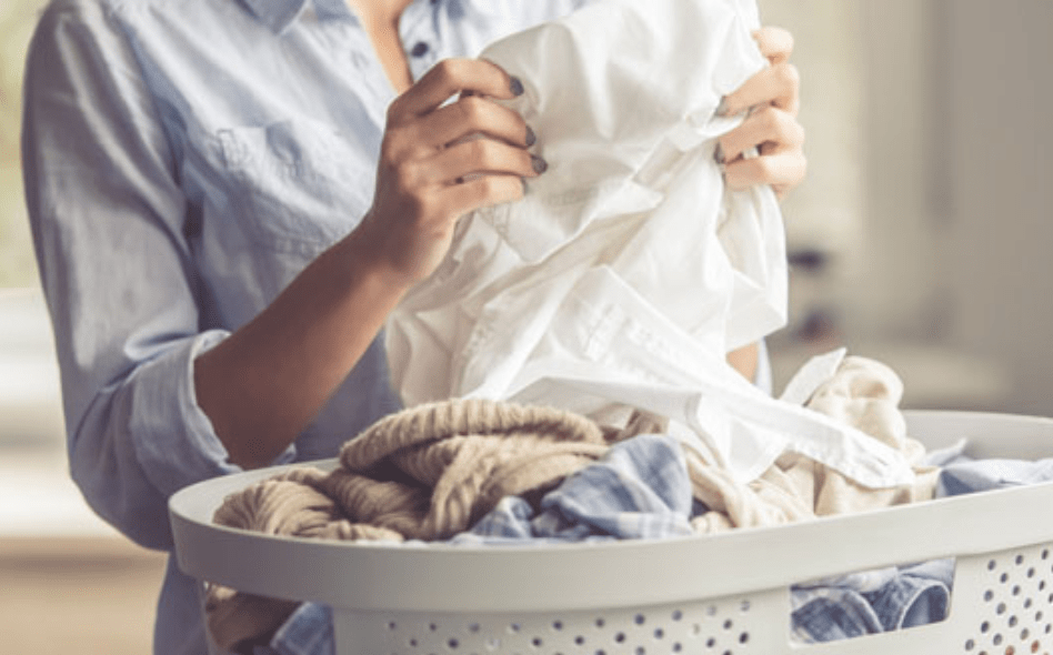 inspecting the clothes after laundering