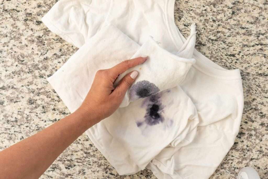 blotting the stain on cloth